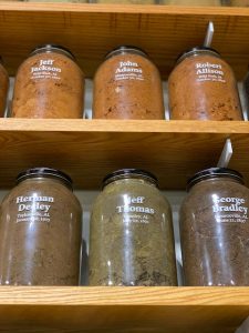 Collection of jars of earth from lynching sites in Alabama.